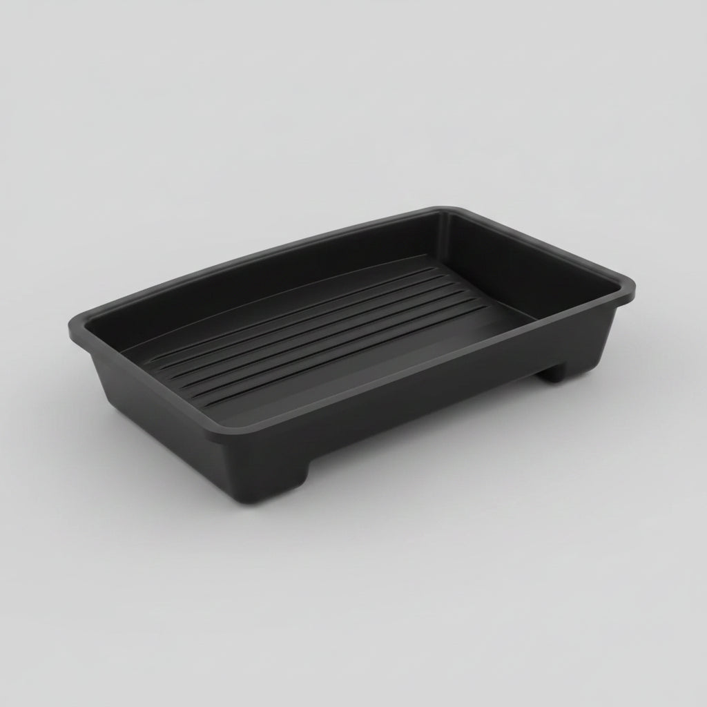 Black plastic tray on a white background