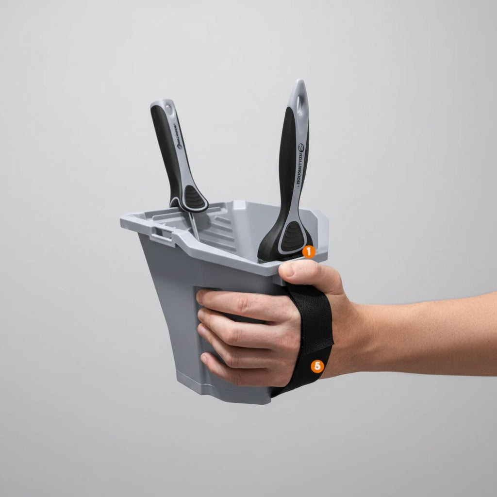 Gray cleaning tool set with attachments held by a hand on a white background