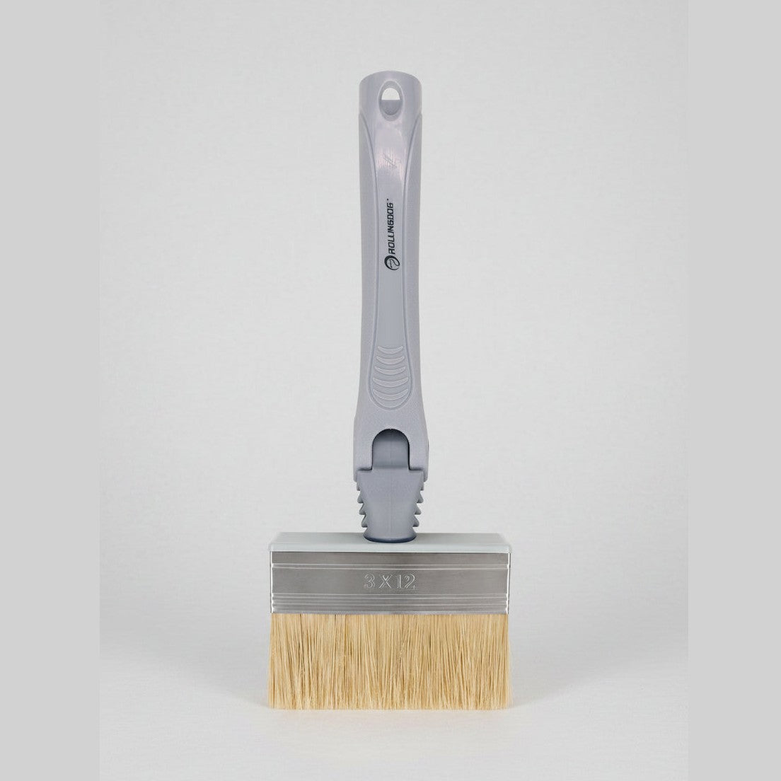 Paint brush with a gray handle and beige bristles on a white background